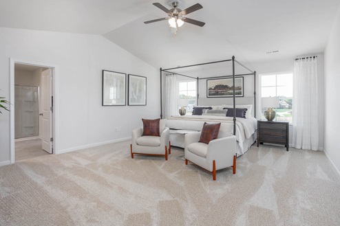 Bedroom with natural lighting and carpet flooring