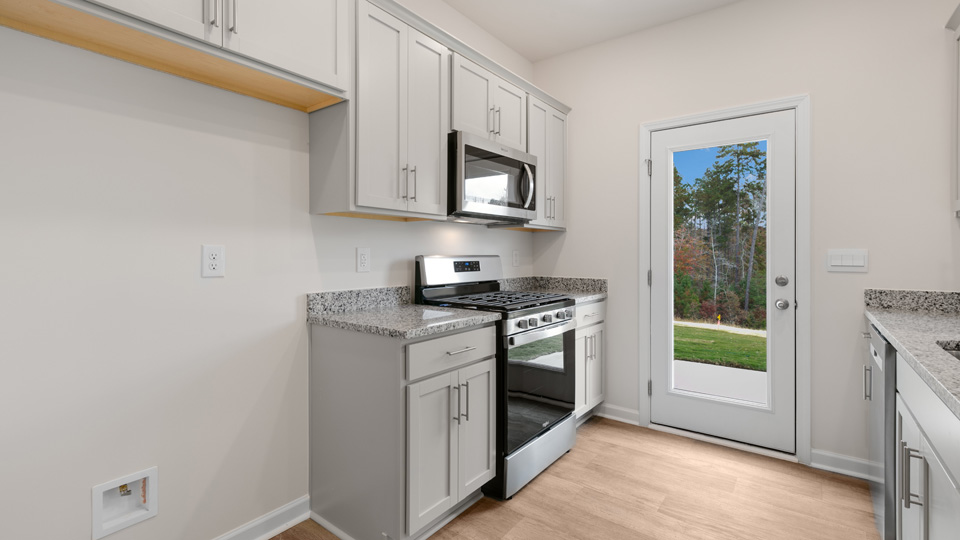 Kitchen with grey cabinets