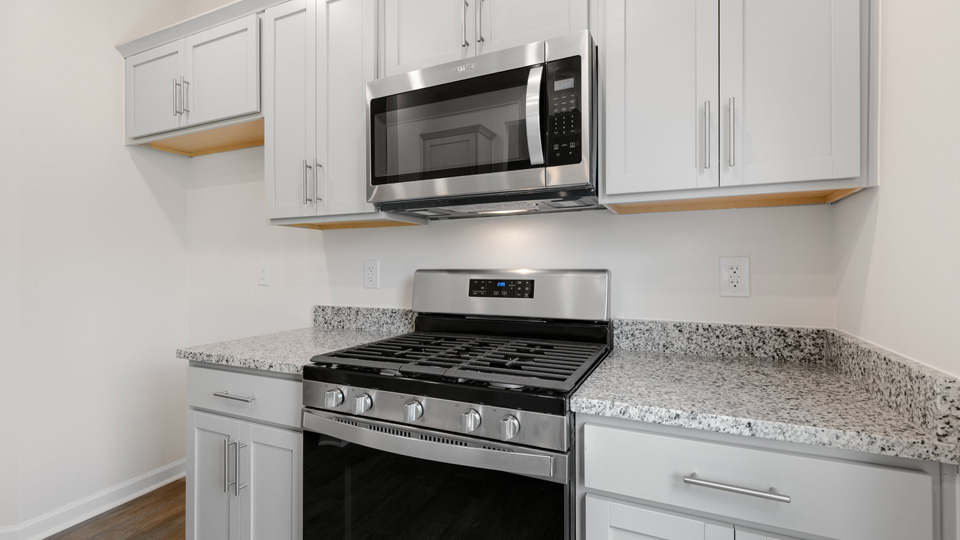 Kitchen with grey cabinets