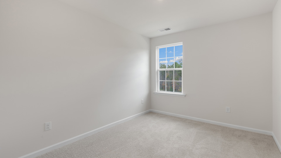 Bedroom with carpet
