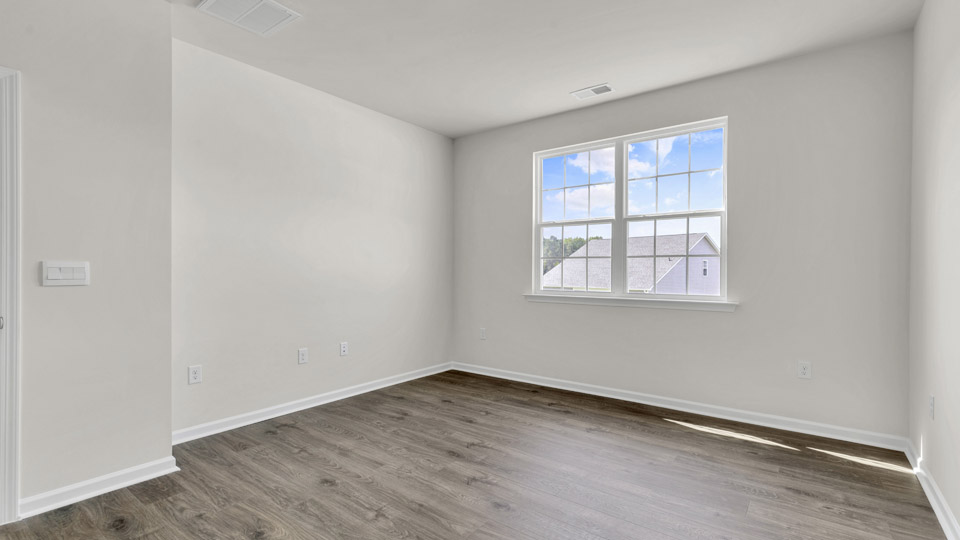 bedroom with revwood flooring