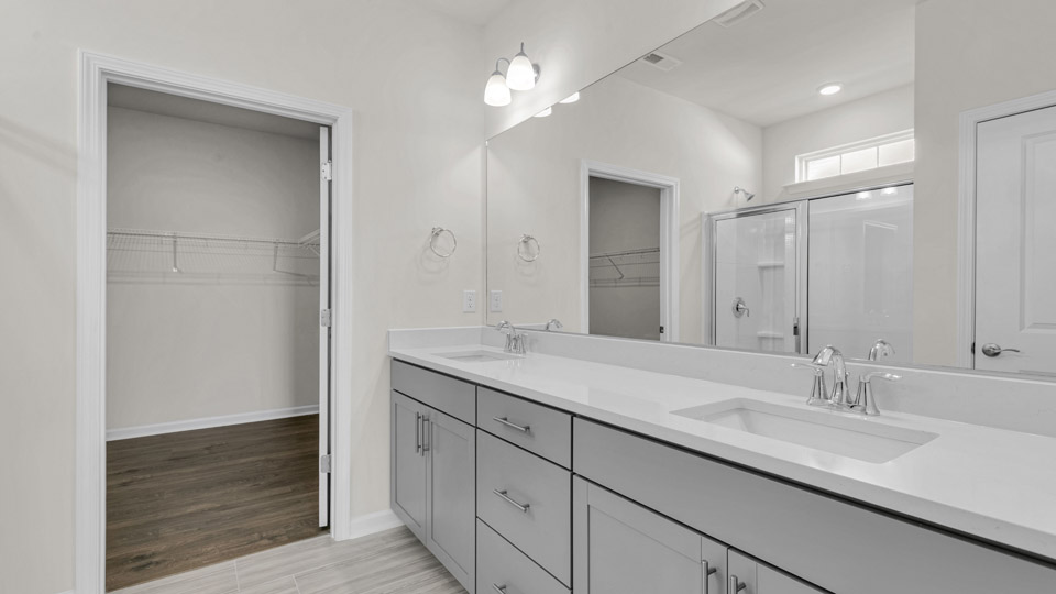 bathroom with quartz countertops