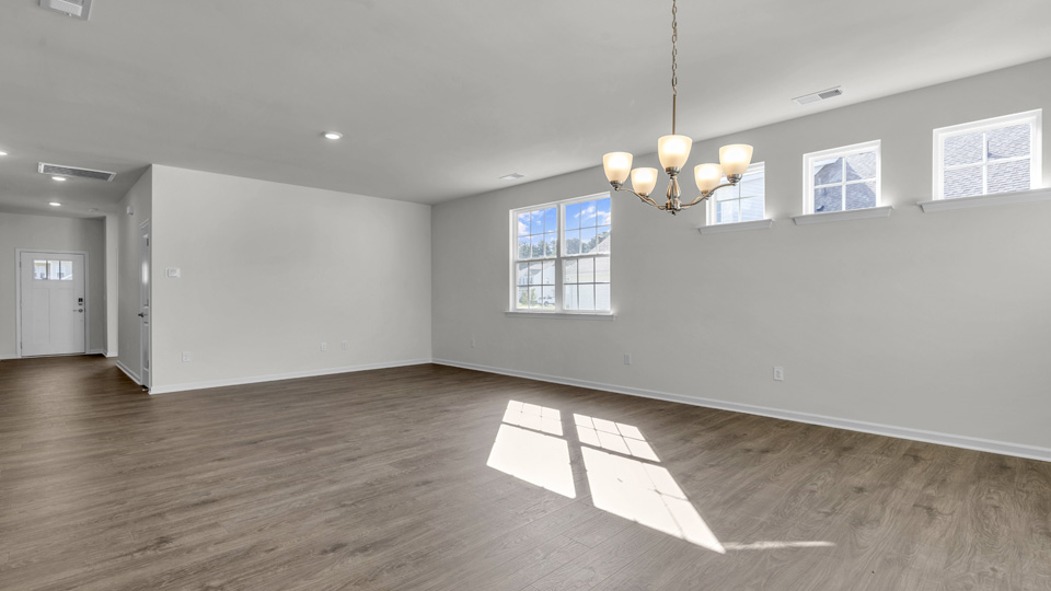 living room with revwood flooring