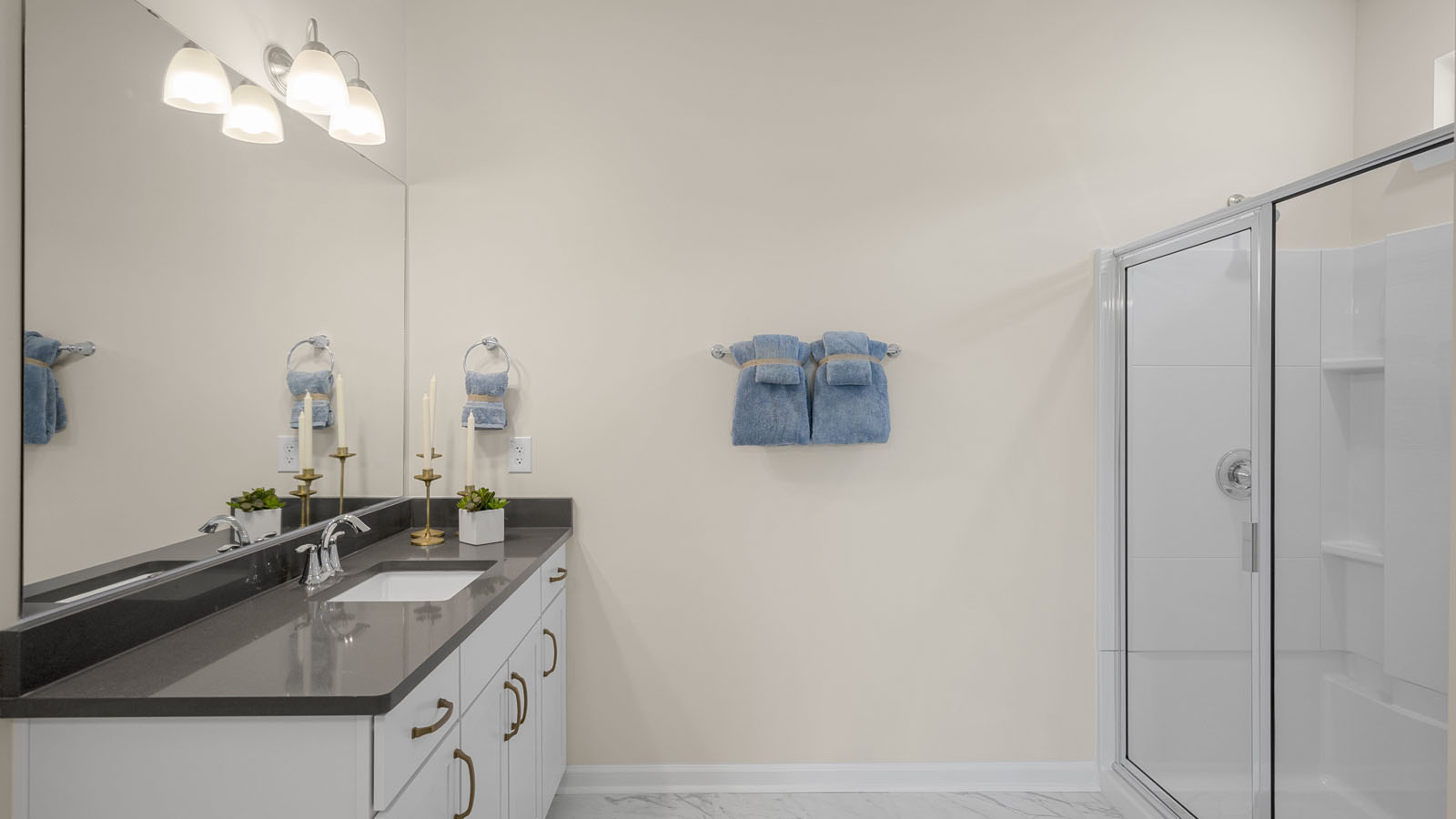 bathroom with quartz countertops