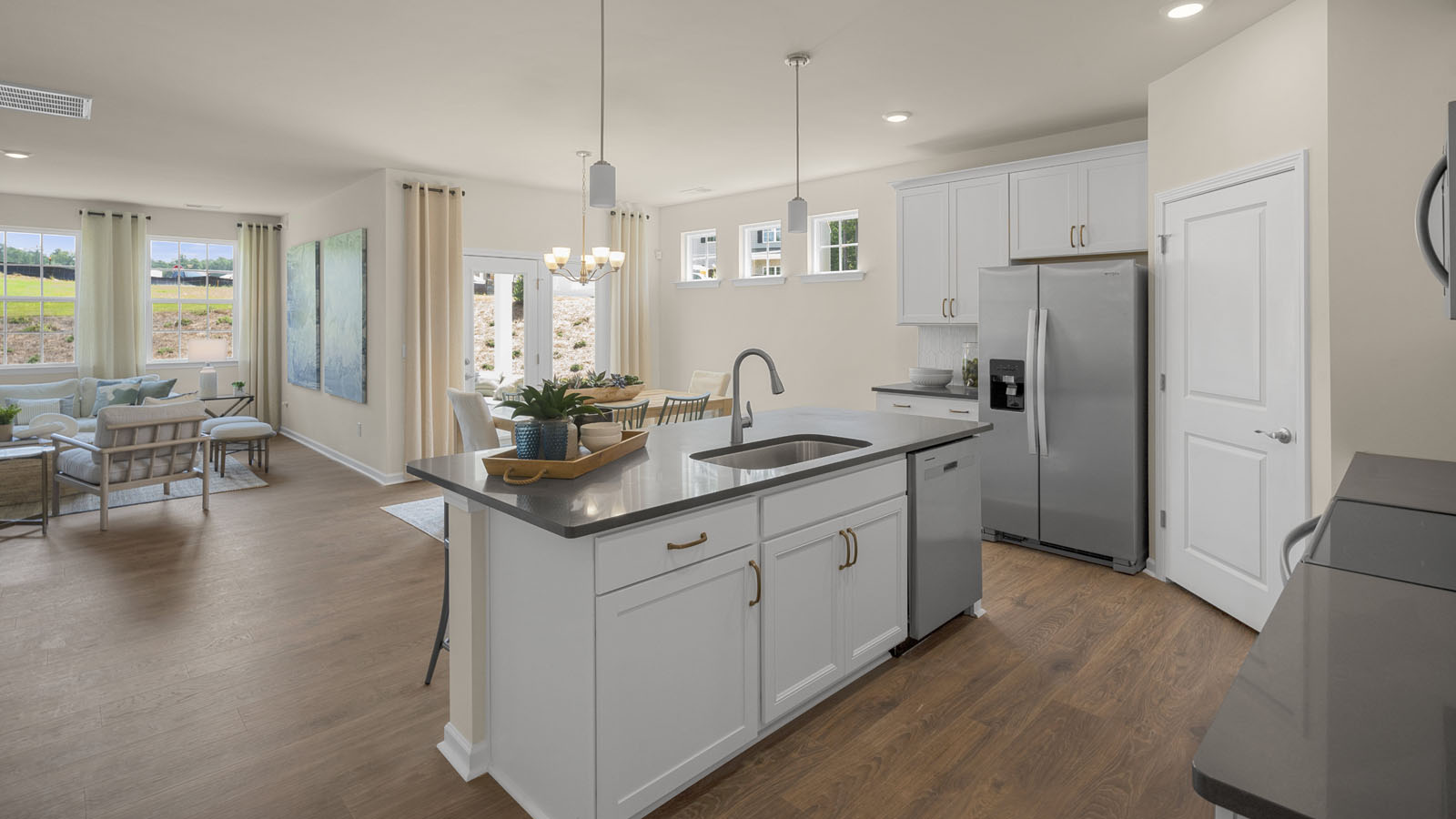 kitchen with white cabinets and quartz countertops