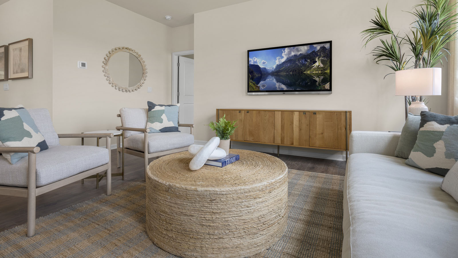 living room with no fireplace and revwood flooring