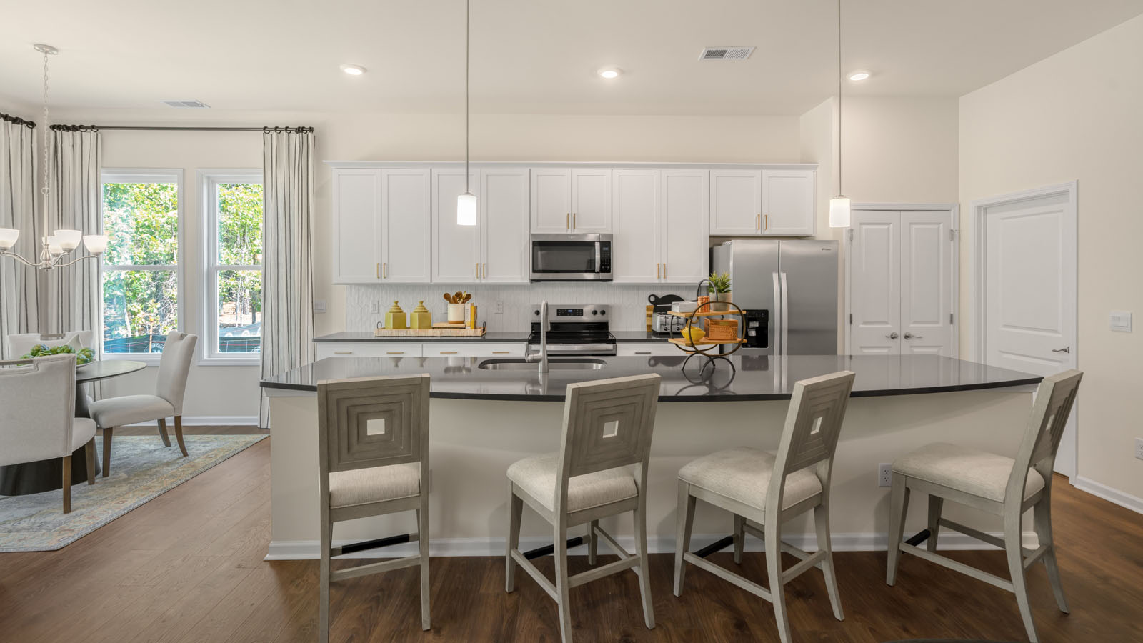 kitchen with white cabinets and quartz countertops