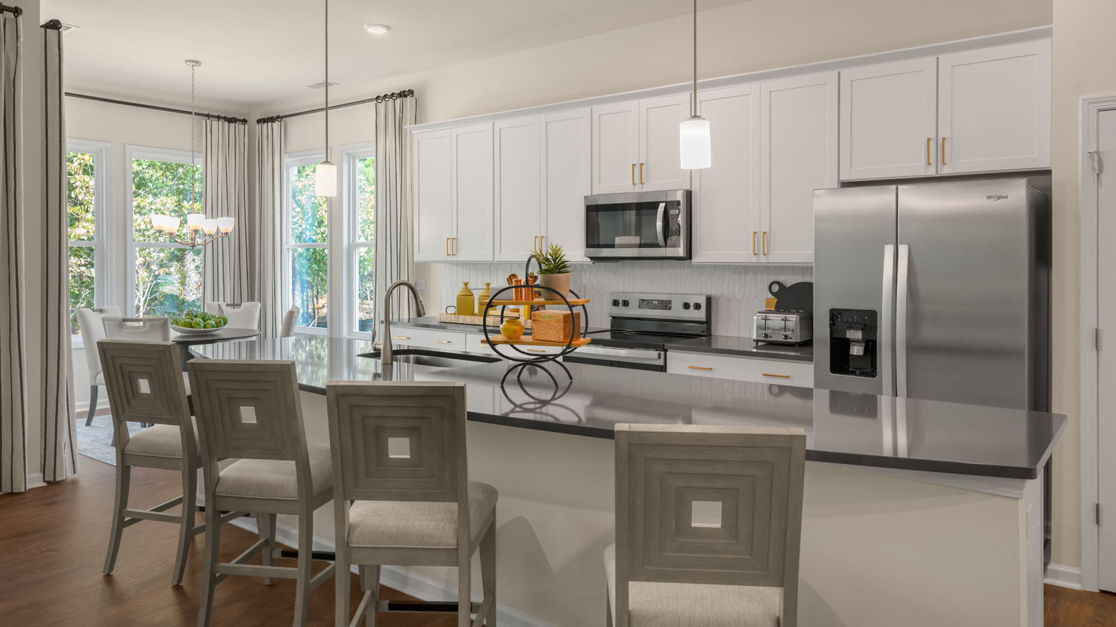 kitchen with white cabinets and quartz countertops