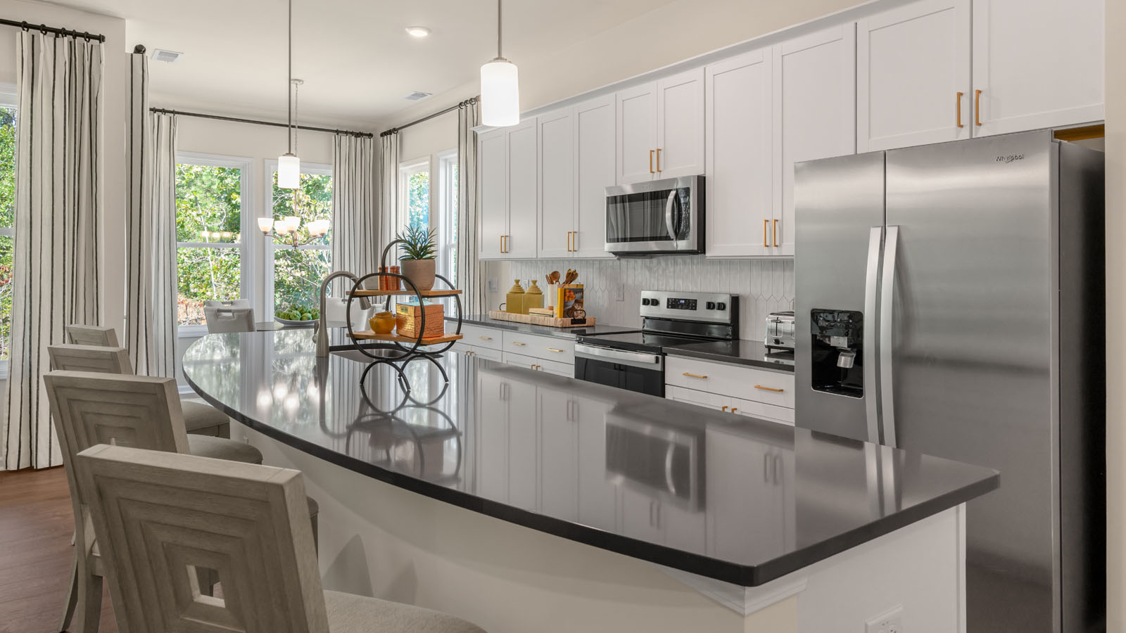 kitchen with white cabinets and quartz countertops
