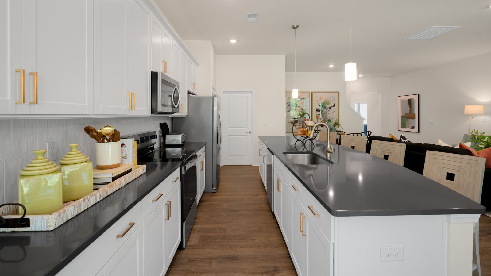 kitchen with white cabinets and quartz countertops