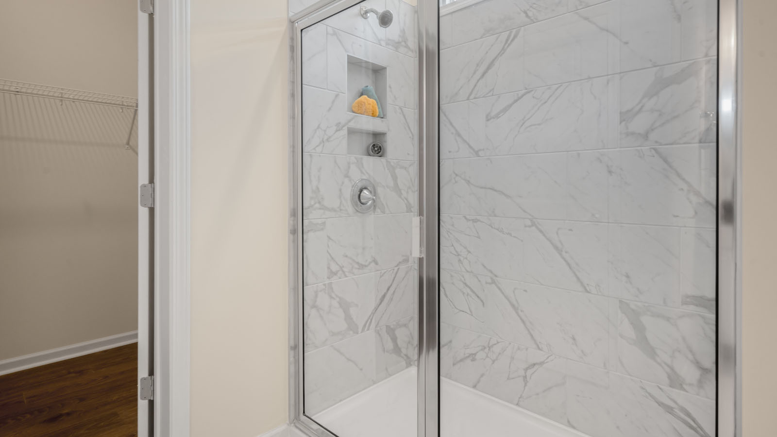 walk-in shower with glass doors