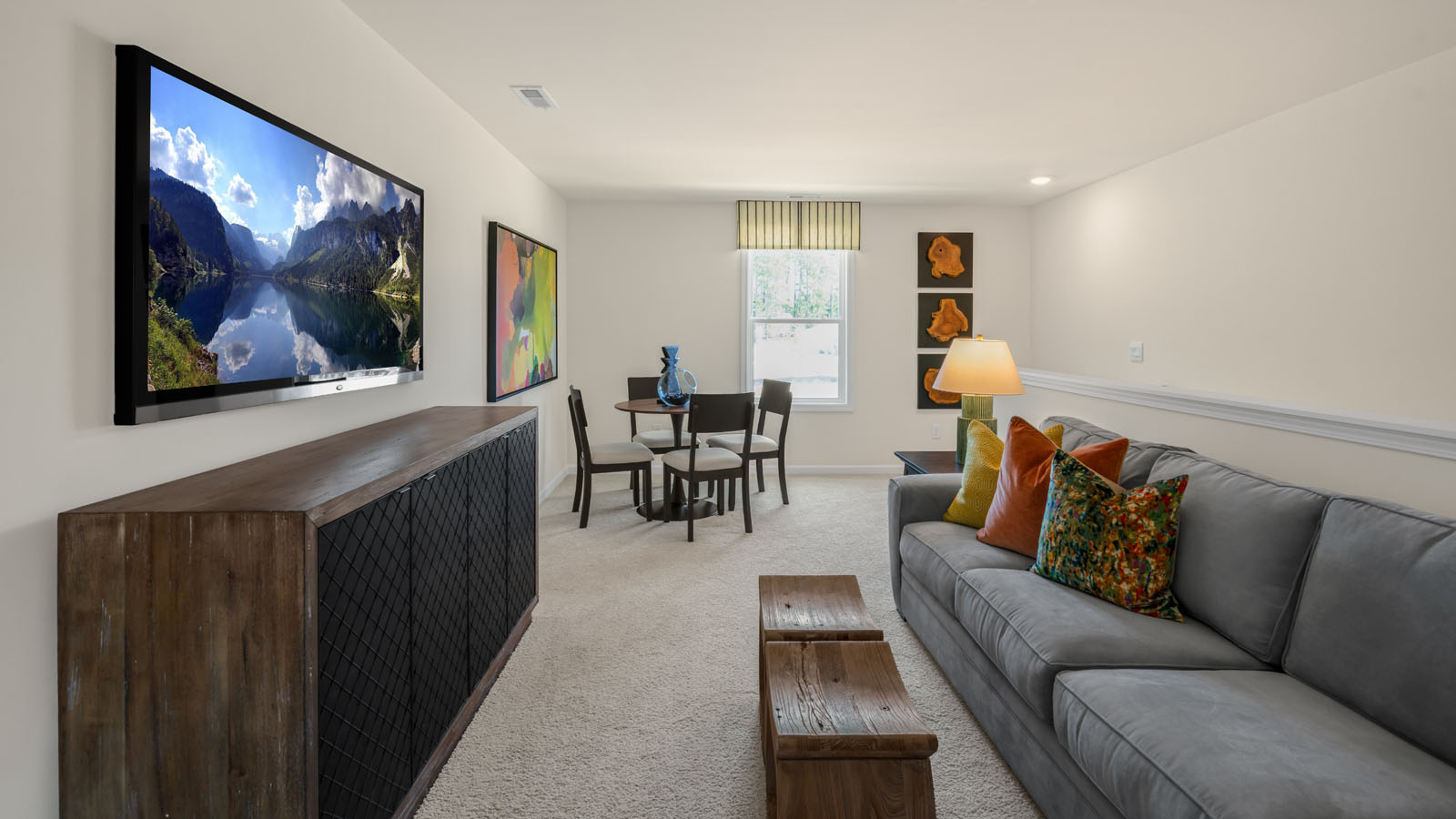 upstairs bonus room with carpet flooring
