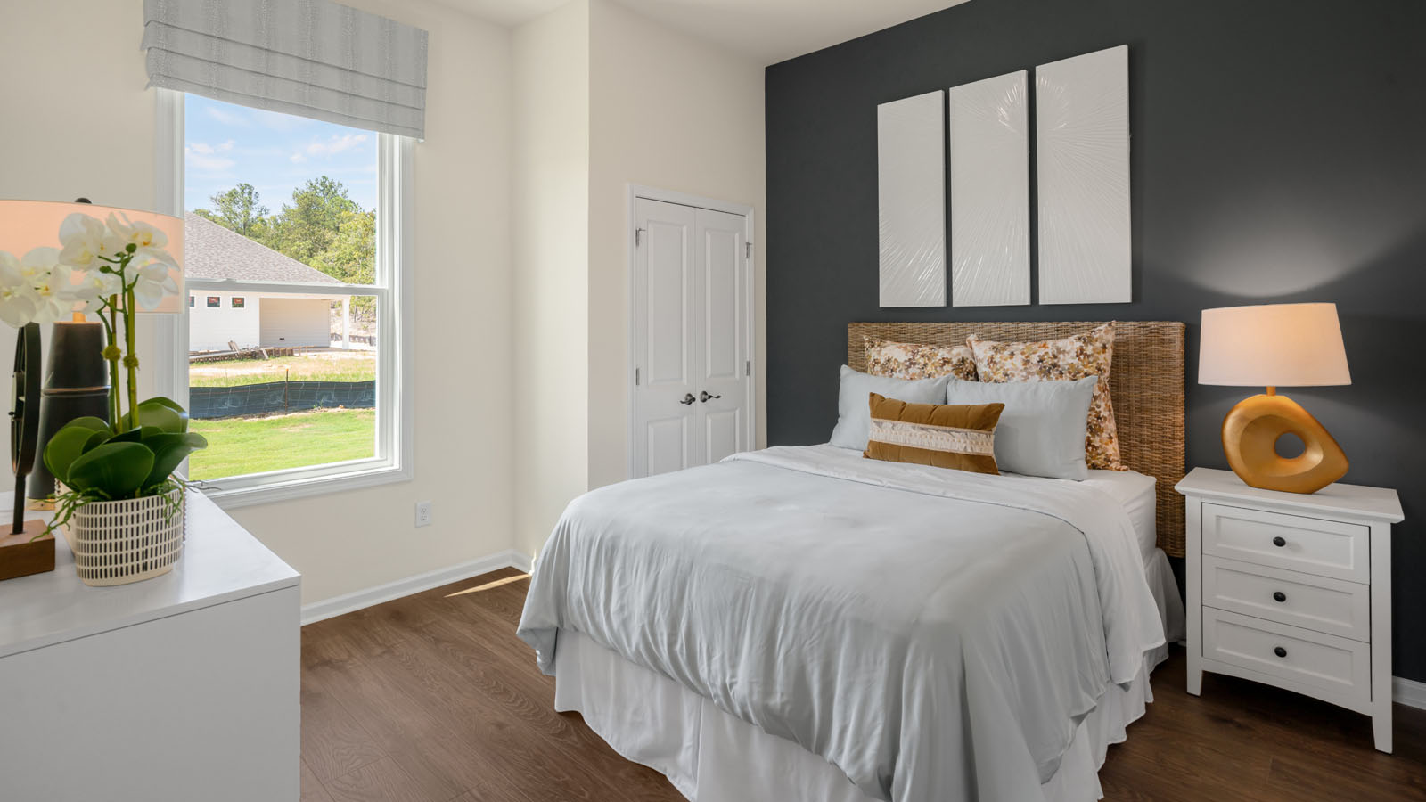 bedroom with revwood flooring