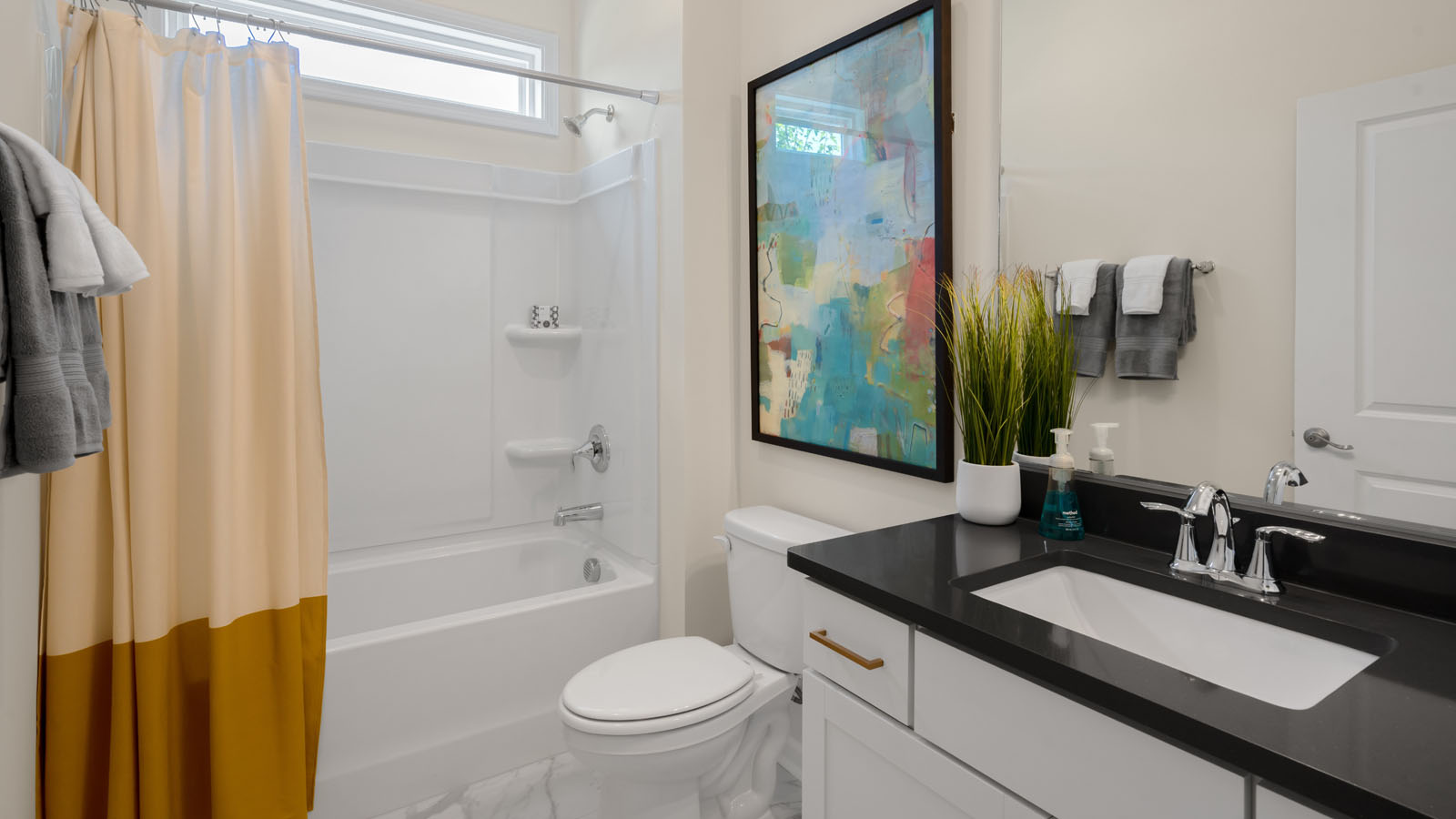 bathroom with quartz countertops