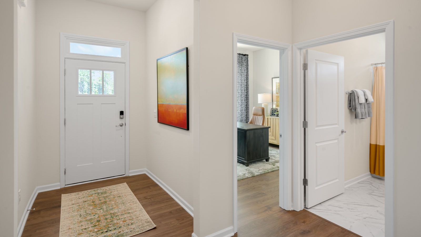 foyer entryway with revwood flooring