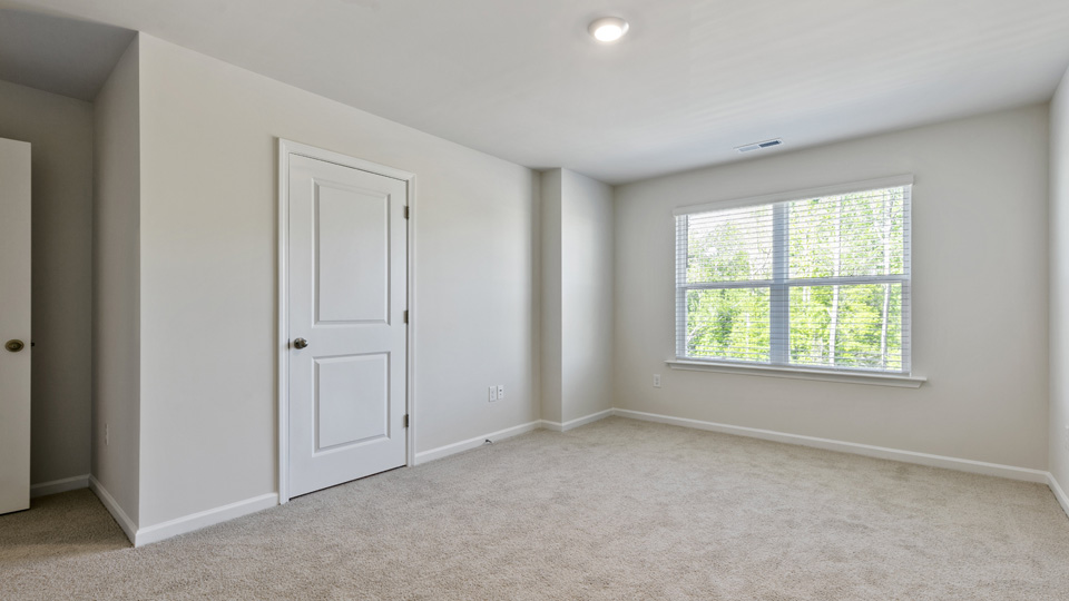 Bedroom with carpet