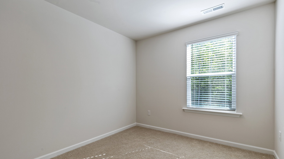 Bedroom with carpet
