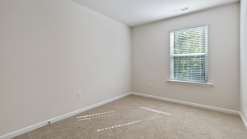 Bedroom with carpet
