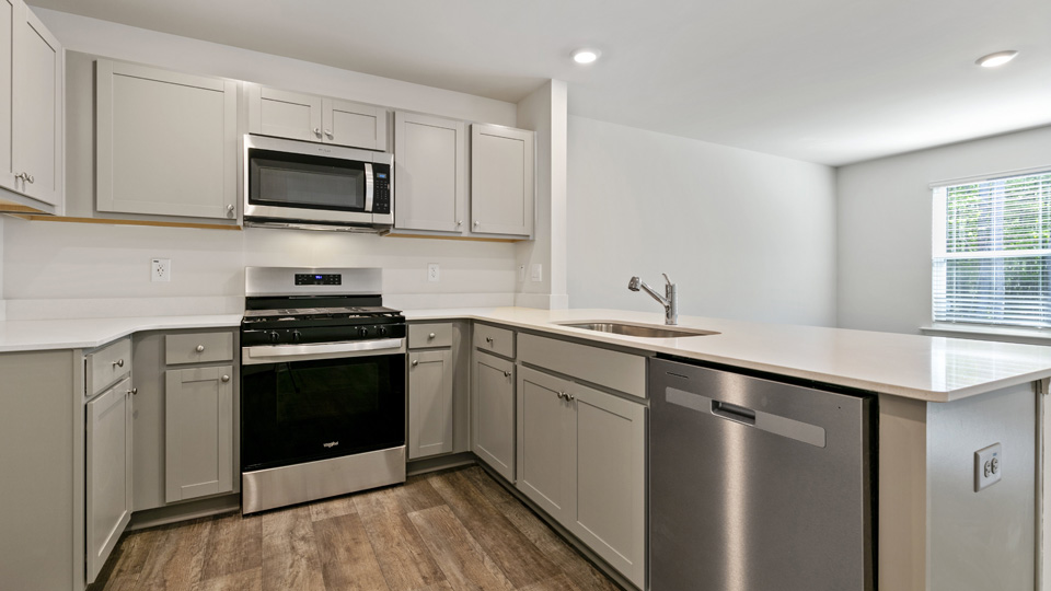 Kitchen with grey cabinets