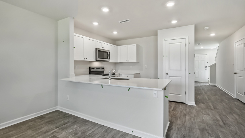 Kitchen with white cabinets