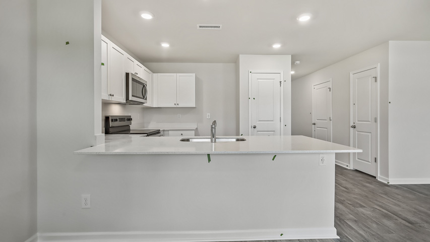 Kitchen with white cabinets