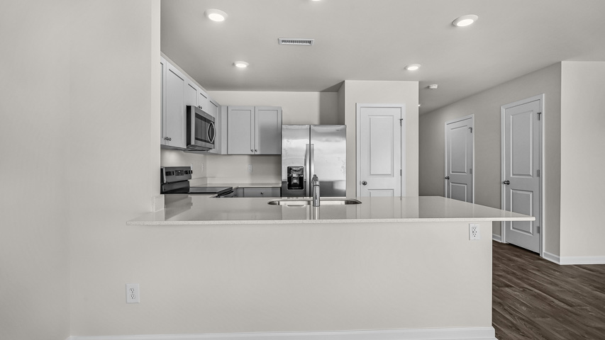 Kitchen with grey cabinets
