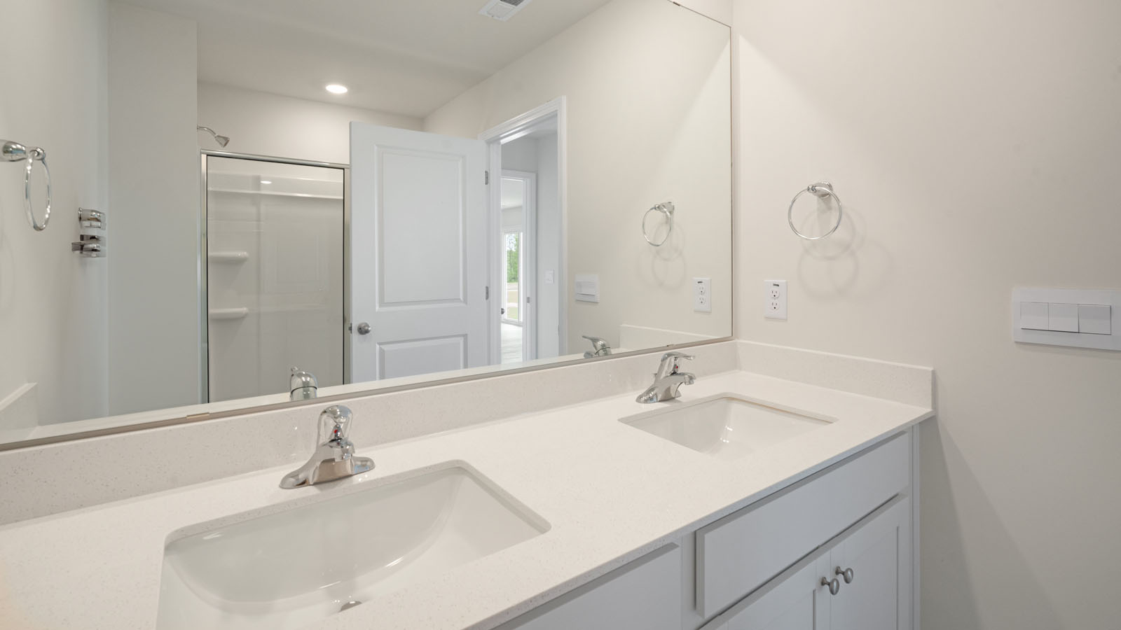 Bathroom with white cabinets