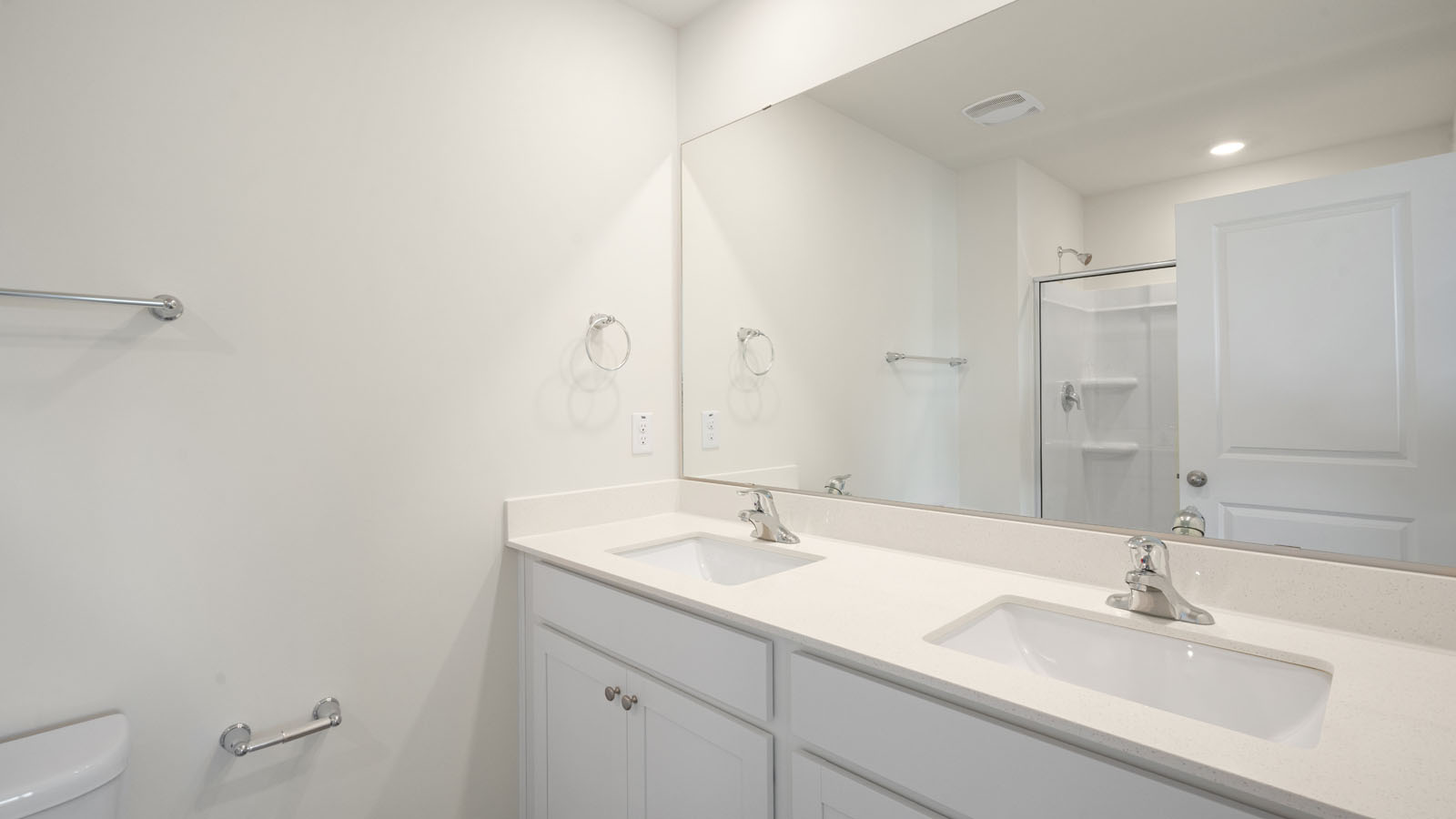 Bathroom with white cabinets