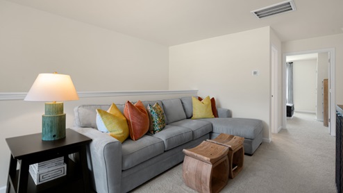 upstairs living room with carpet