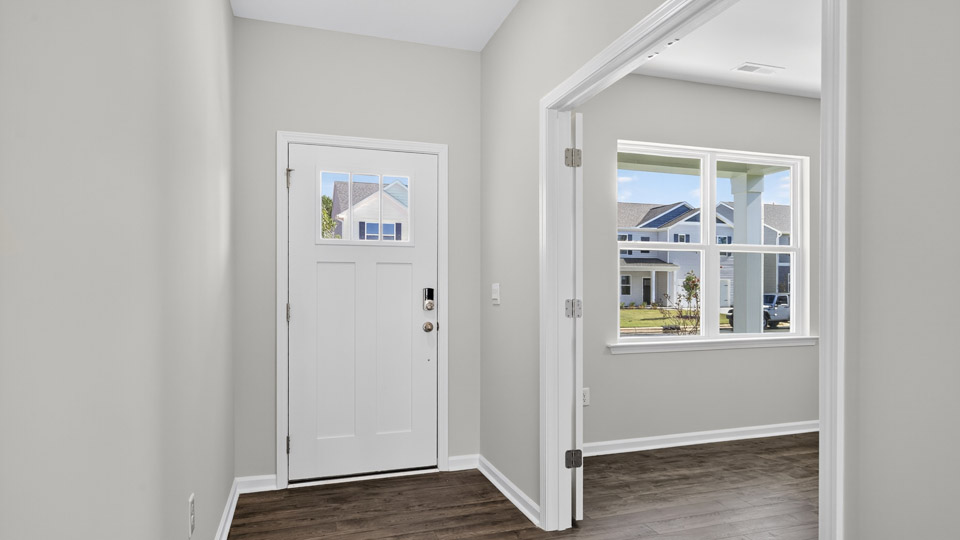 foyer entryway with revwood flooring