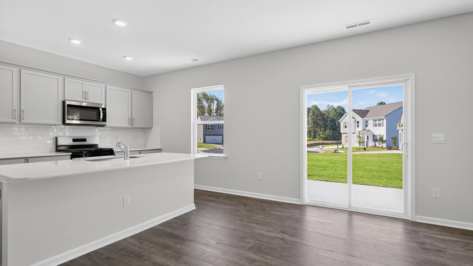 kitchen and sliding glass doors to patio