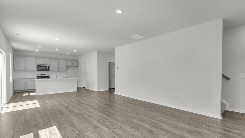 living room with revwood flooring