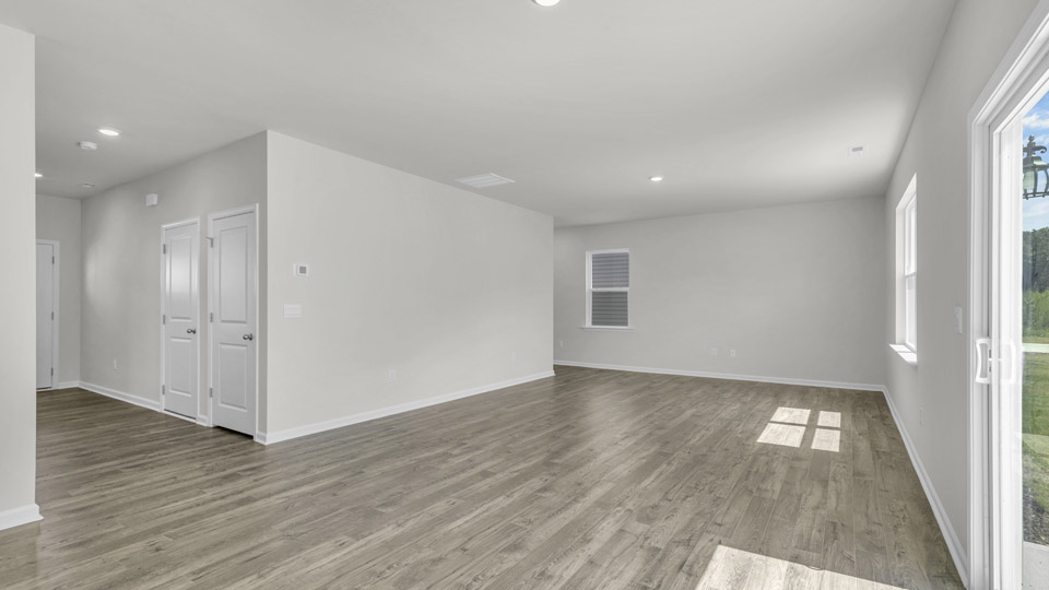 living room with revwood flooring