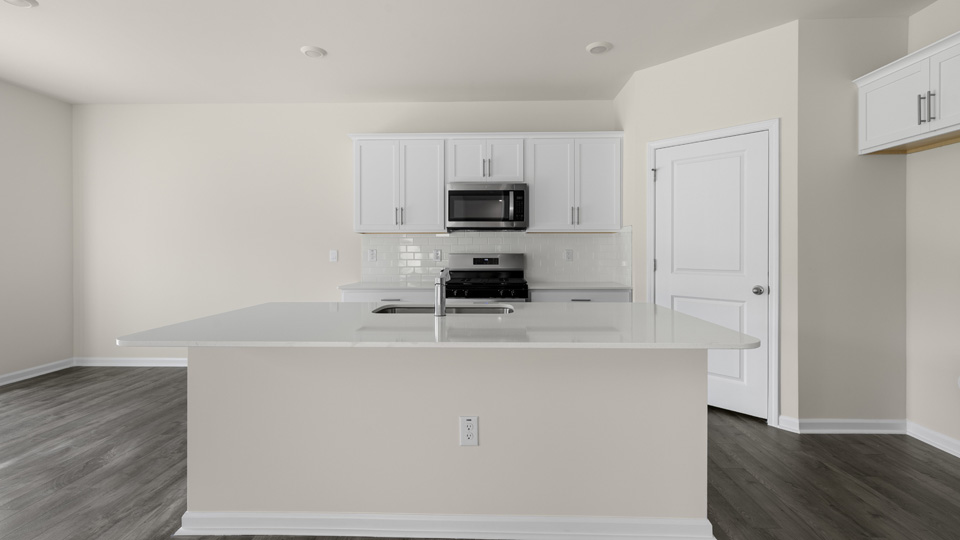 Kitchen with white cabinets