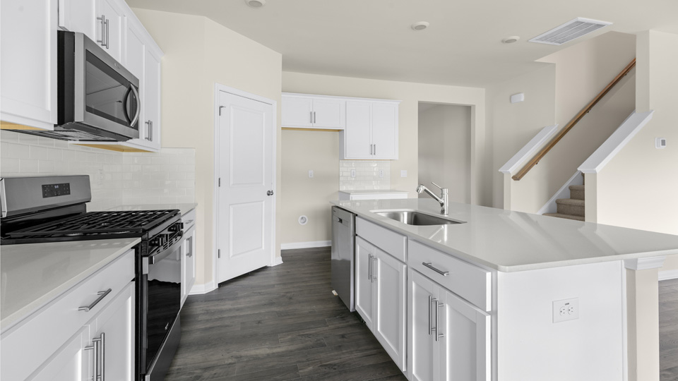 Kitchen with white cabinets