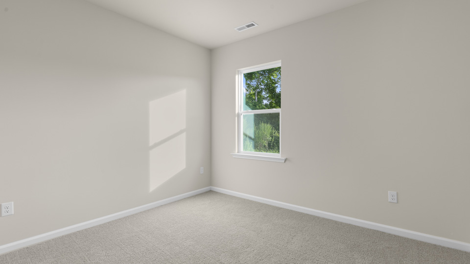 Bedroom with carpet