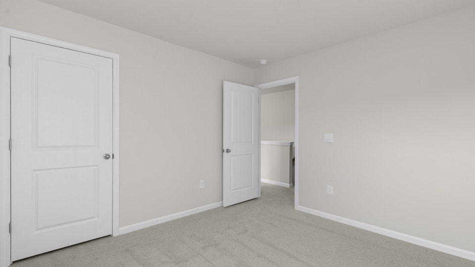 Bedroom with carpet