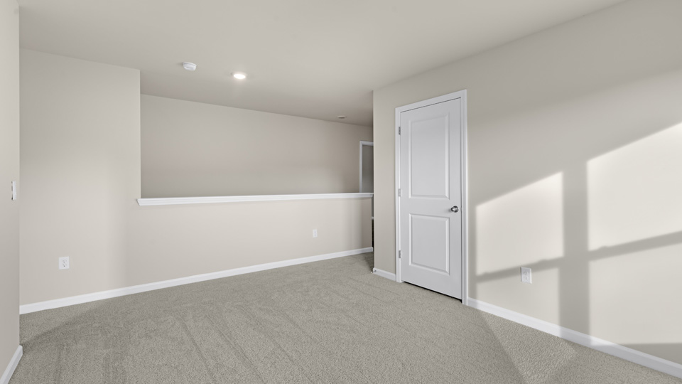 Loft area with carpet