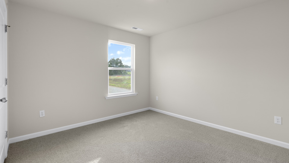 Bedroom with carpet