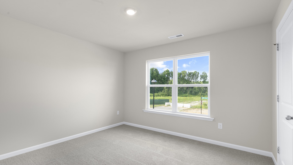 Bedroom with carpet