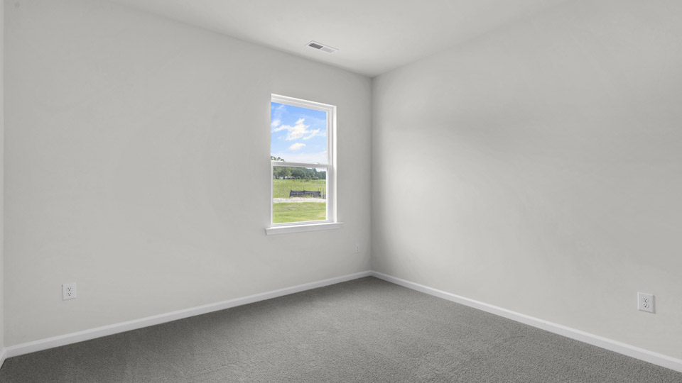 loft with carpet flooring