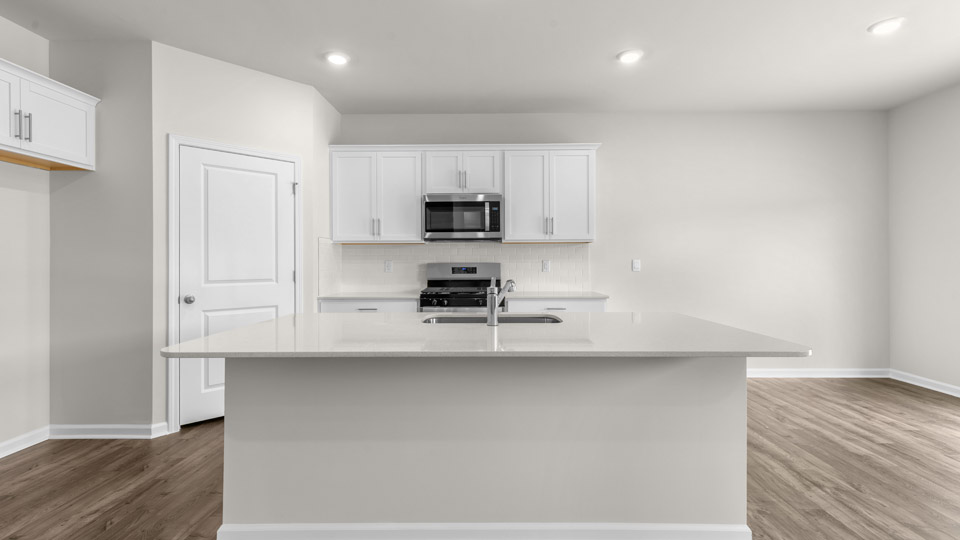kitchen with quartz countertops and stainless steel appliances