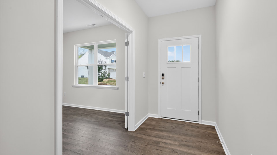 foyer entryway with revwood flooring