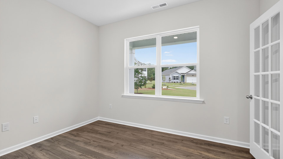 study with french doors and revwood flooring