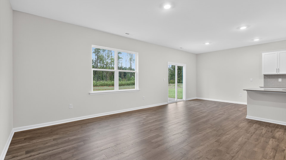 living room with revwood flooring