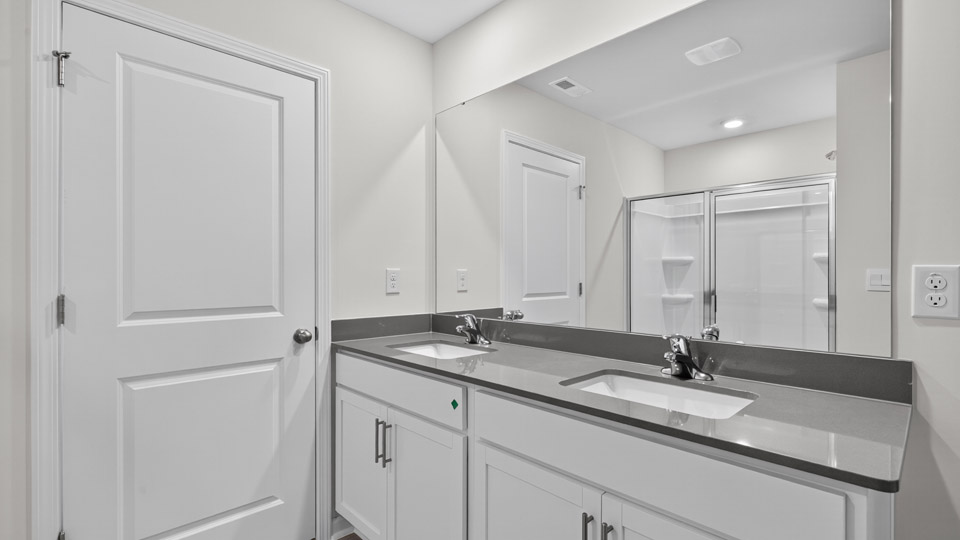 bathroom with quartz countertops