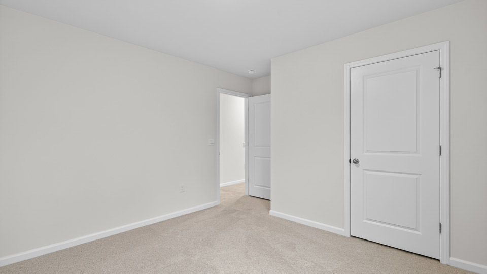 loft with carpet flooring