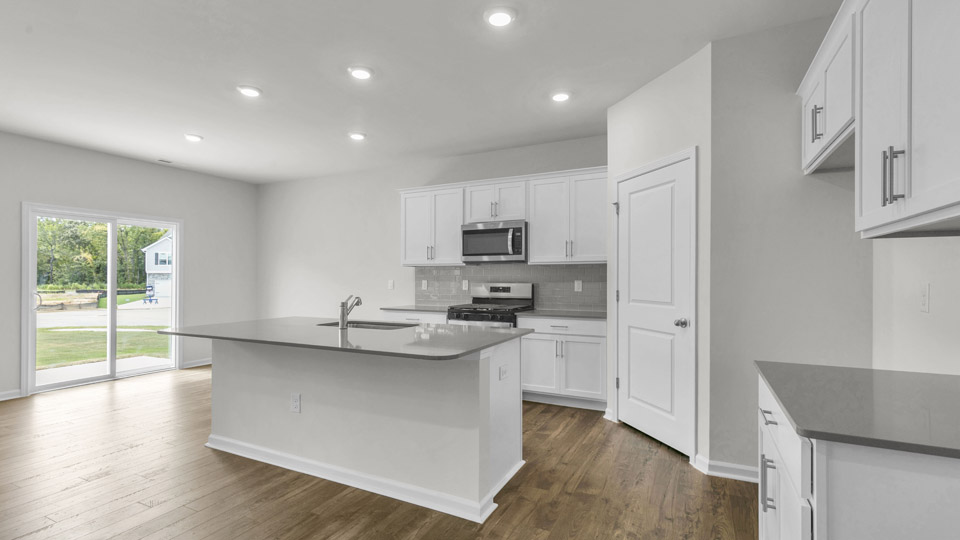 kitchen with quartz countertops and stainless steel appliances