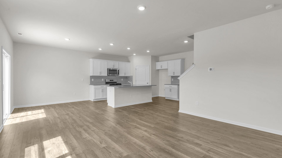 living room with revwood flooring