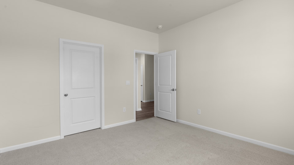 Bedroom with carpet